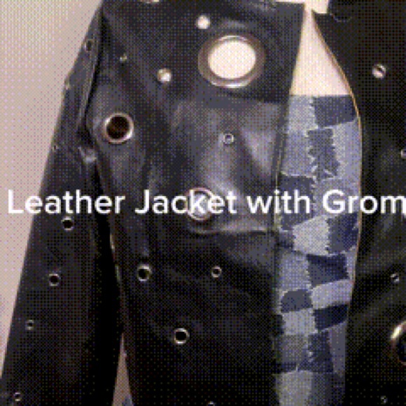 Black Leather Jacket with Edgy Metallic Details - Picture 3 of 6